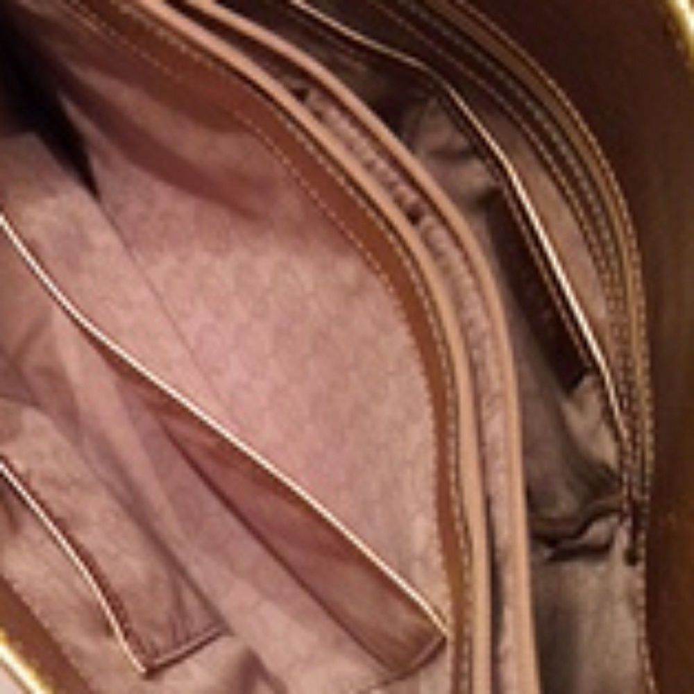 Purse size of purse is 11 inches high an 18 inches
